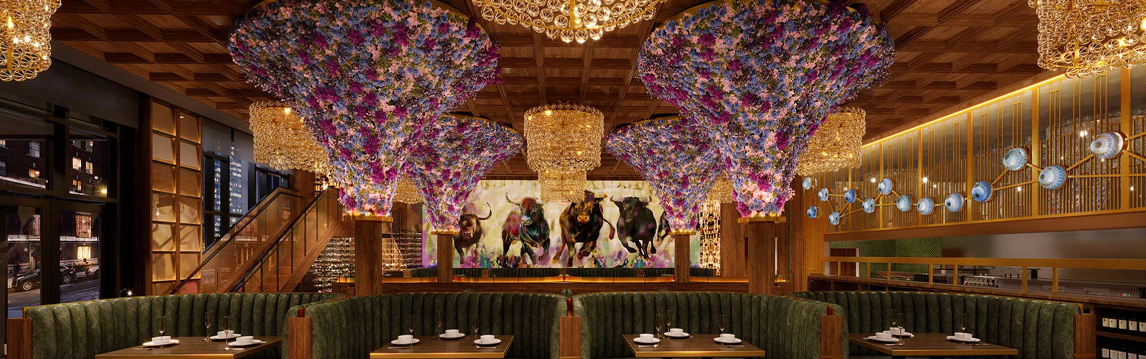 Main dining room with large decorative floral chandeliers at Butcher & Rose in Columbus, Ohio.